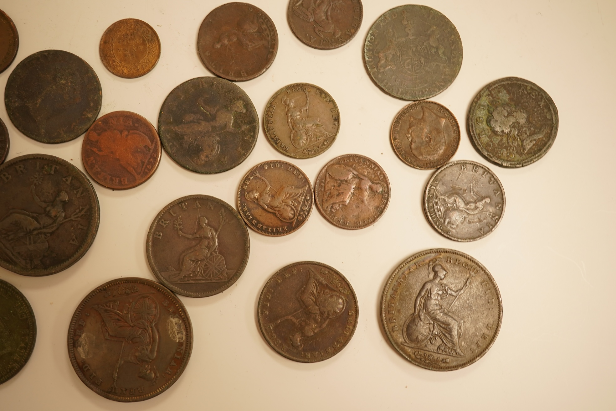 Twenty three copper coins including a William IV penny